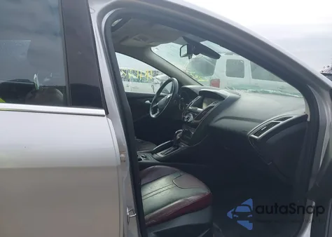 2012 Ford Focus Titanium z USA, uszkodzony, nr VIN 1FAHP3N25CL300457